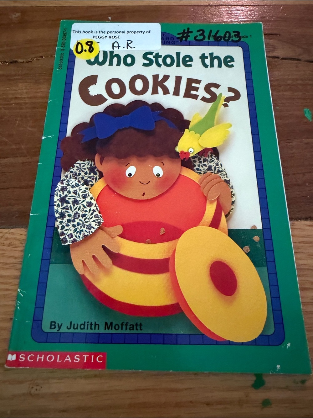 Scholastic Green Cover Picture Book with Yellow and Red Cookie Drum